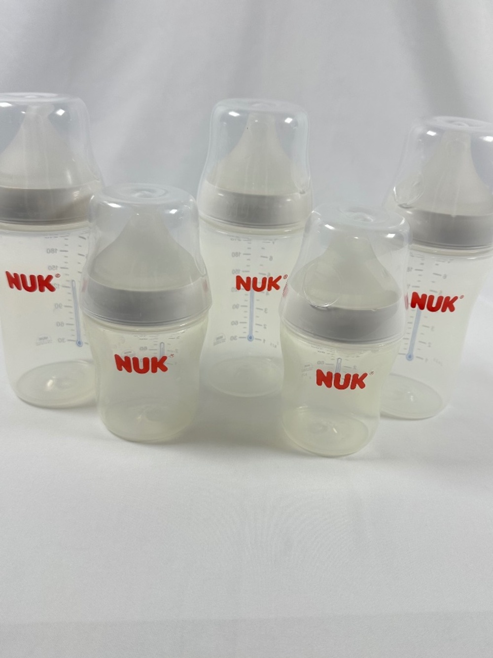 Nuk 5 pack, Plastic, 3-8 ounce and 2-5 ounce Bottles with Nipples